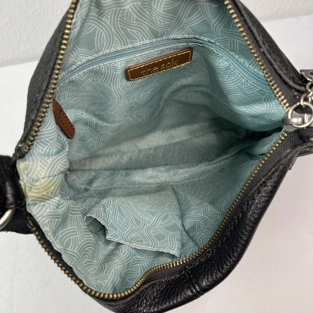 The Sak Crossbody Black Genuine‎ Leather Tooled Embossed Purse Tassels